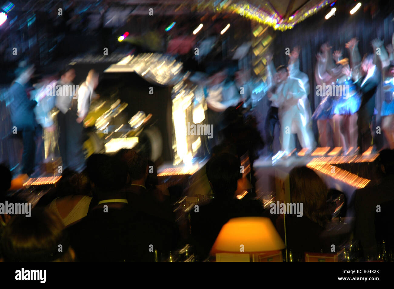 Feier party celebration Farbblitz colorflash Bewegungsunschärfe blurred motion Bühne stage arena Stock Photo