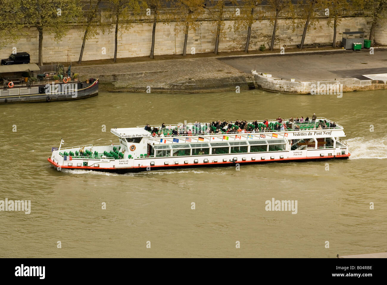Tourist sightseeing boat on River Seine Paris France Stock Photo