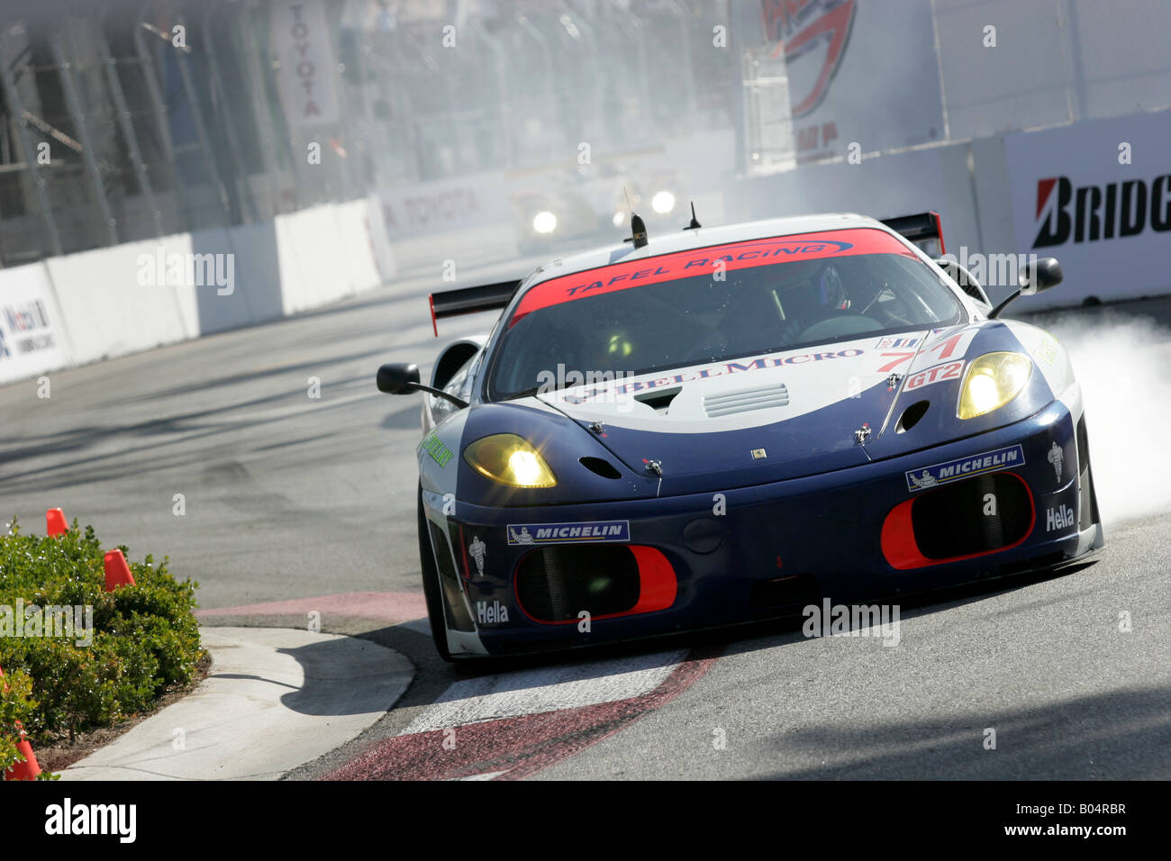 Ferrari F430  hard on the brakes in turn 2 at the American Le Mans Series race in Long Beach, California Stock Photo