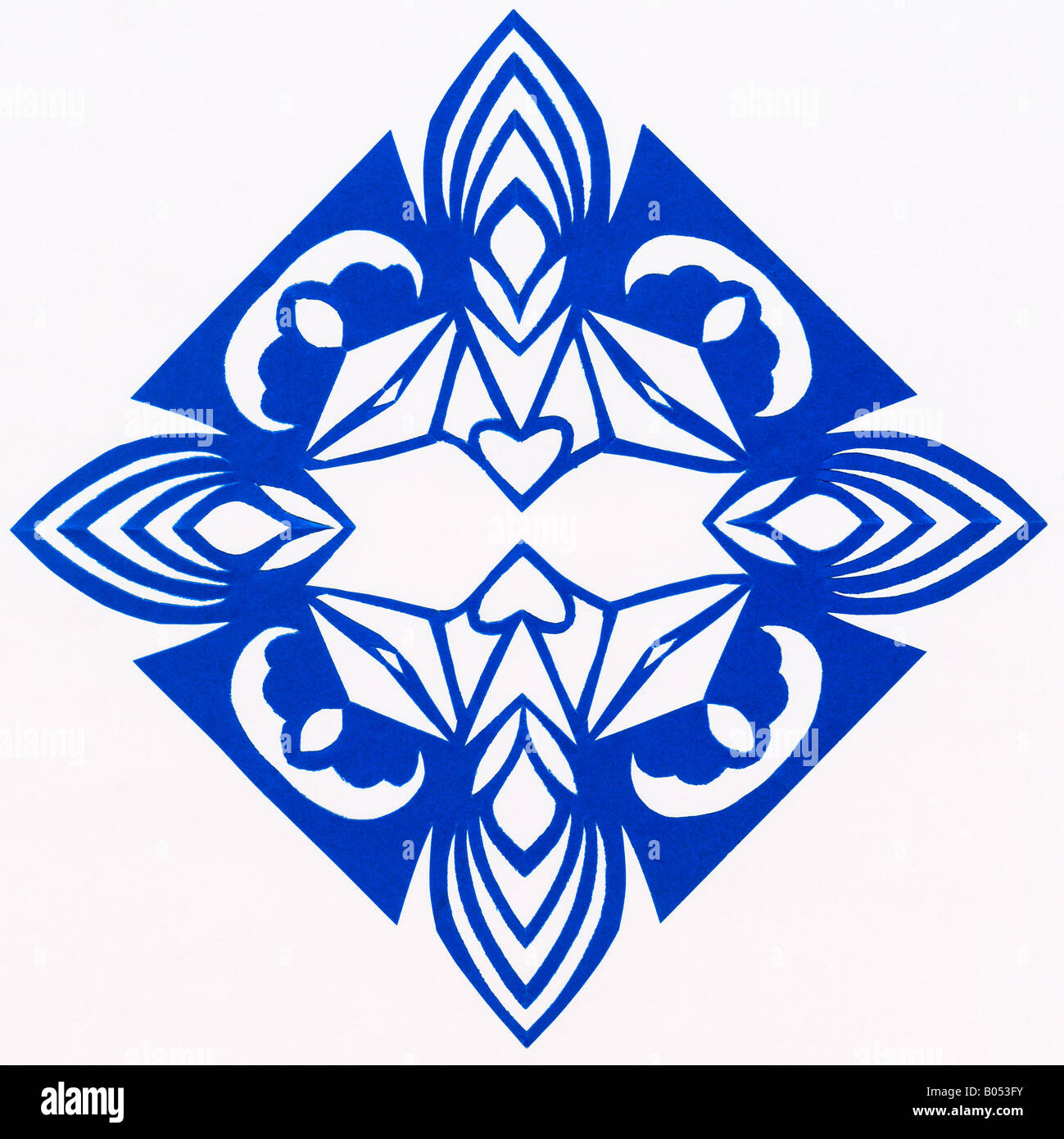 Contemporary paper cutting with symmetrical floral design by Miss Wanda