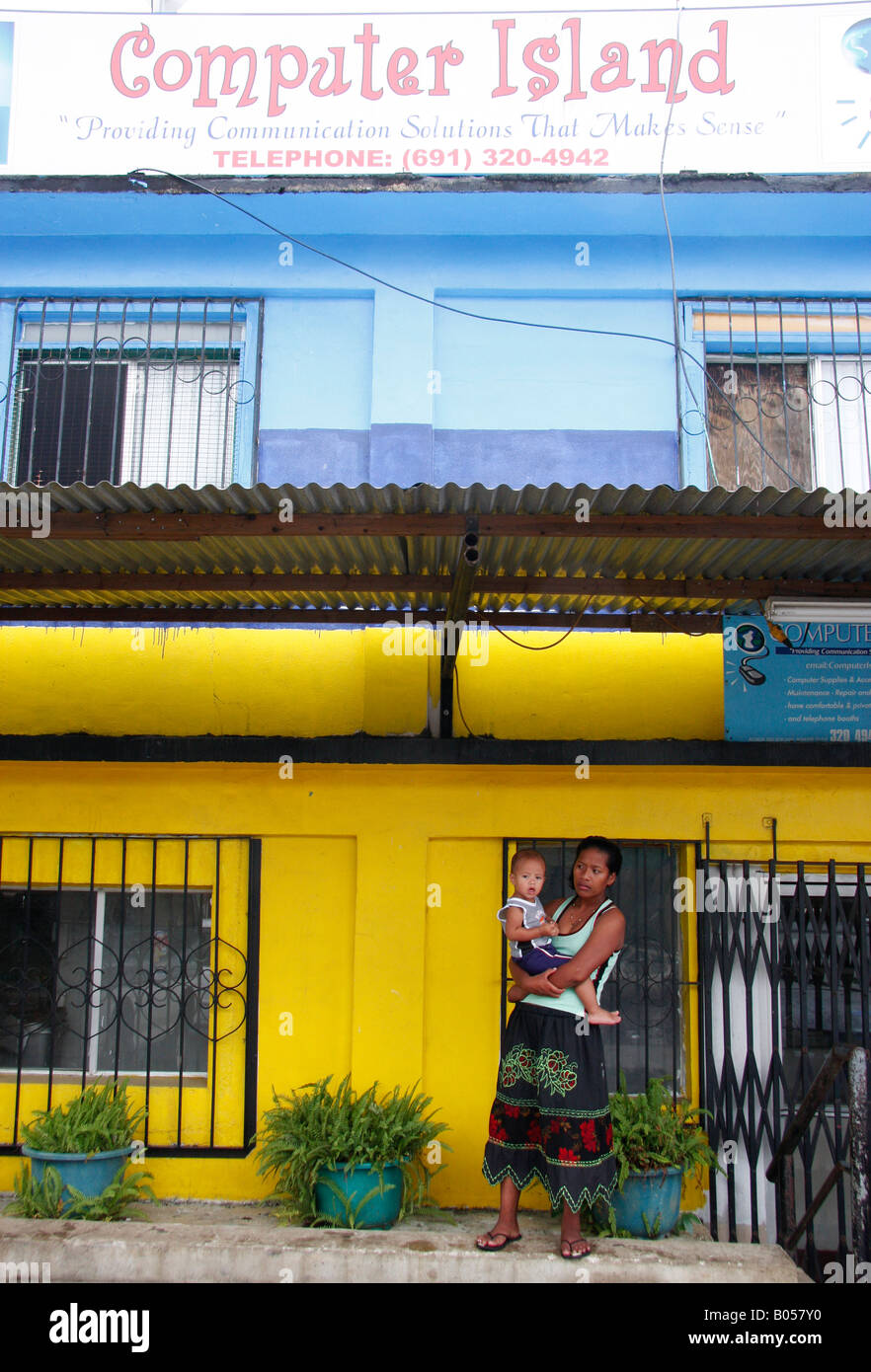 TYPICALLY BRIGHTLY PAINTED SHOP COMPUTER ISLAND  IN POHNPEI,MICRONESIA Stock Photo