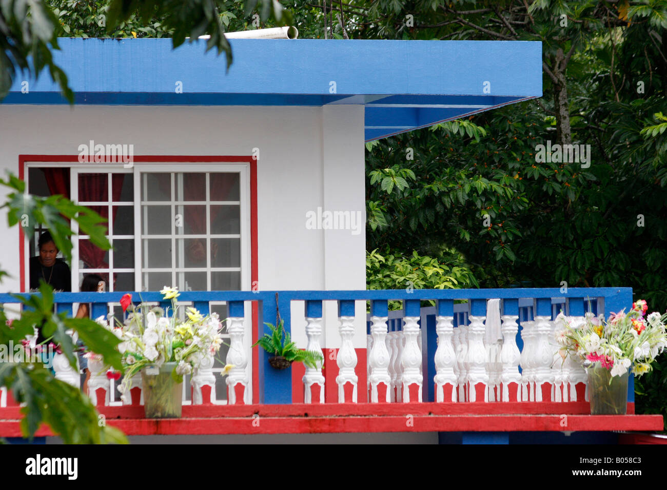 TYPICALLY BRIGHTLY PAINTED HOUSE IN POHNPEI,MICRONESIA Stock Photo