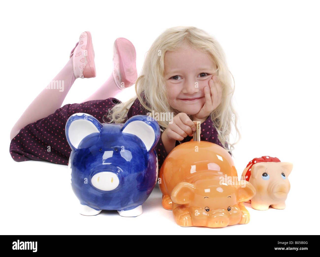 girl with piggy banks Stock Photo - Alamy