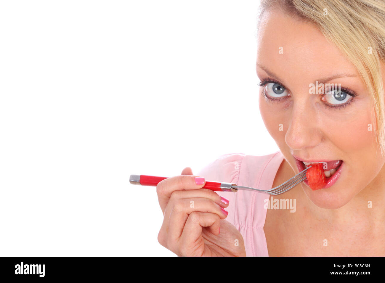 Young Woman Alone Eating And Enjoying A Bowl Of Fresh Healthy Prepared