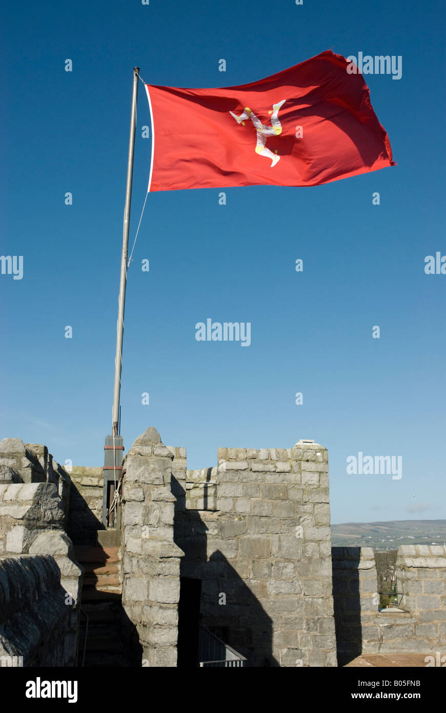 Manx flag fluttering on flagpole at Castle Rushen in Castletown Stock Photo