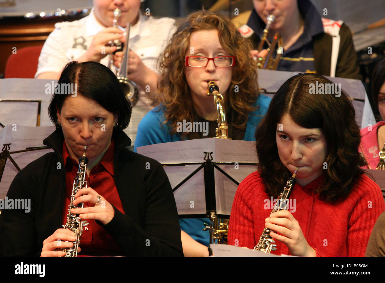 Young musicians play oboe, saxophone and trumpet Stock Photo Alamy