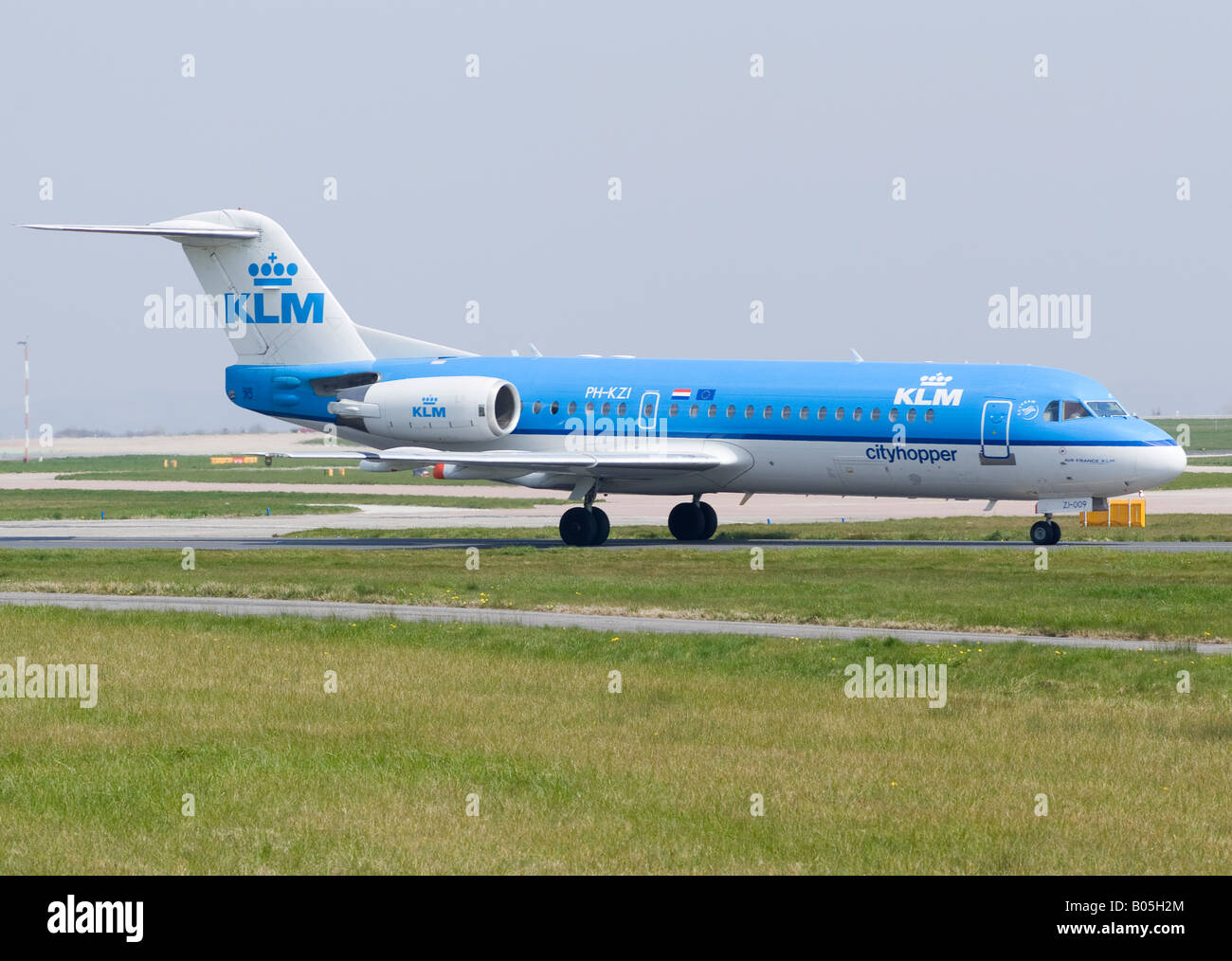 KLM Cityhopper Fokker 70 [F28 Mk070] Taxiing for Take-off at Manchester Ringway Airport England United Kingdom Stock Photo