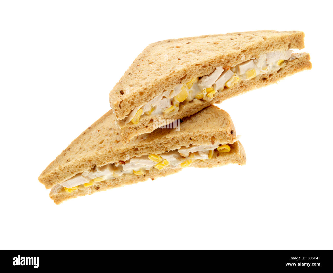 Freshly Prepared Chicken And Sweetcorn Sandwich In Brown Bread Isolated