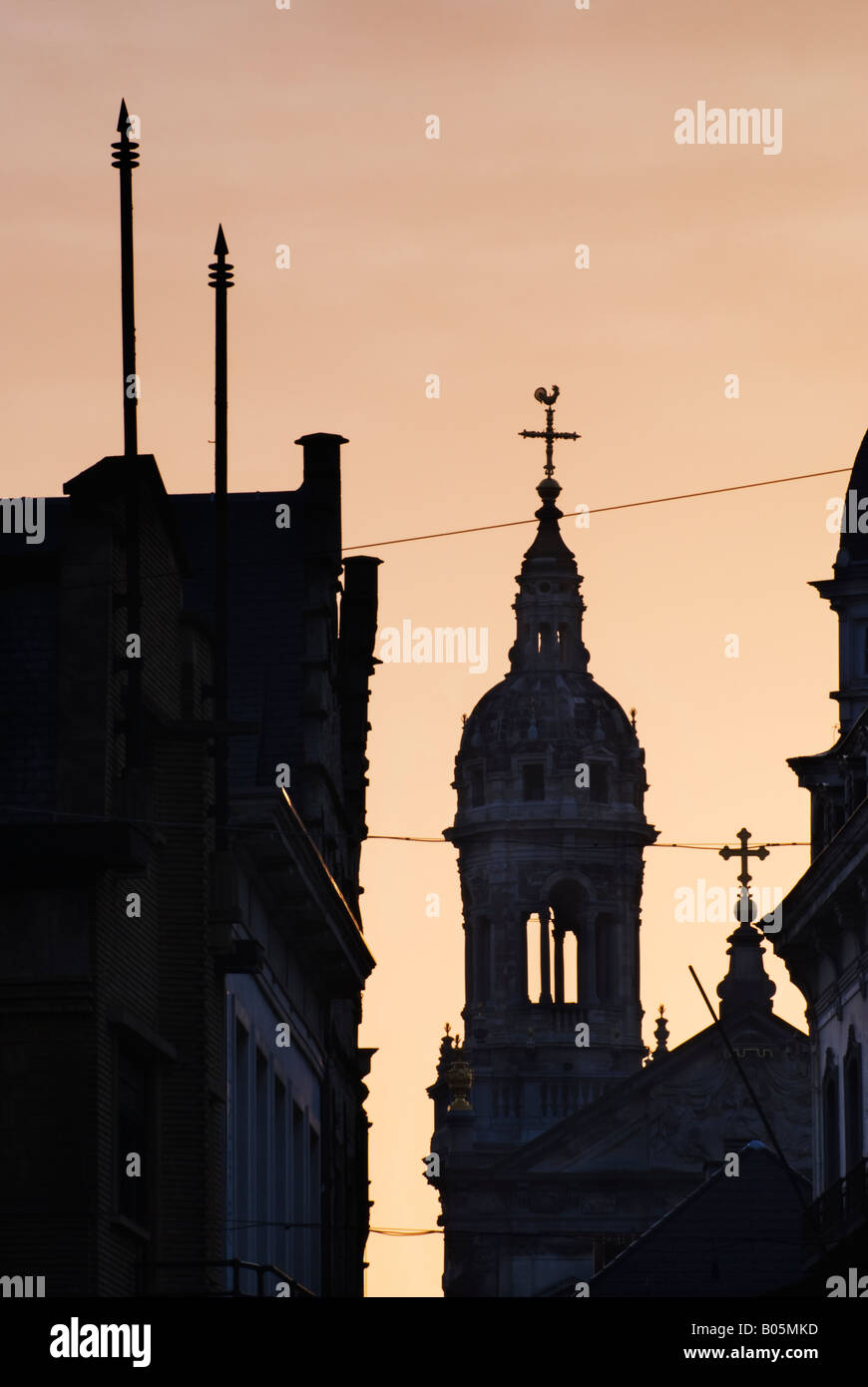 Silhouetted buildings at dawn in Antwerp, Belgium Stock Photo