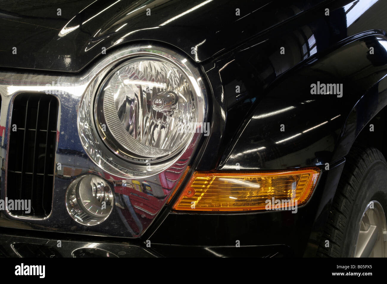 Headlamp and grill of automobile Stock Photo Alamy