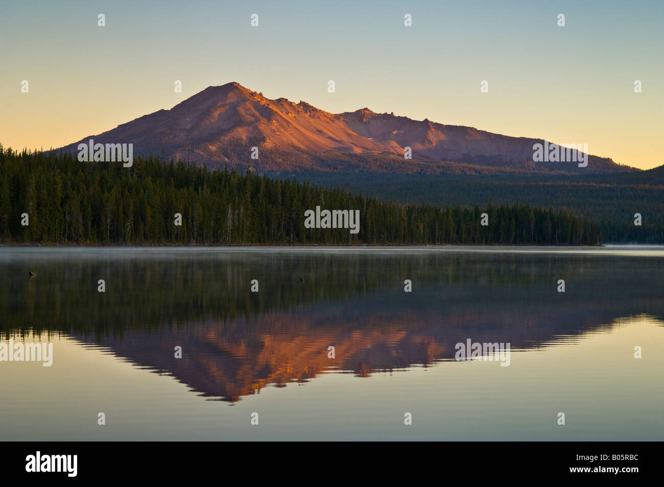 Summit Lake and Diamond Peak at sunrise Cascade Mountains Oregon Stock