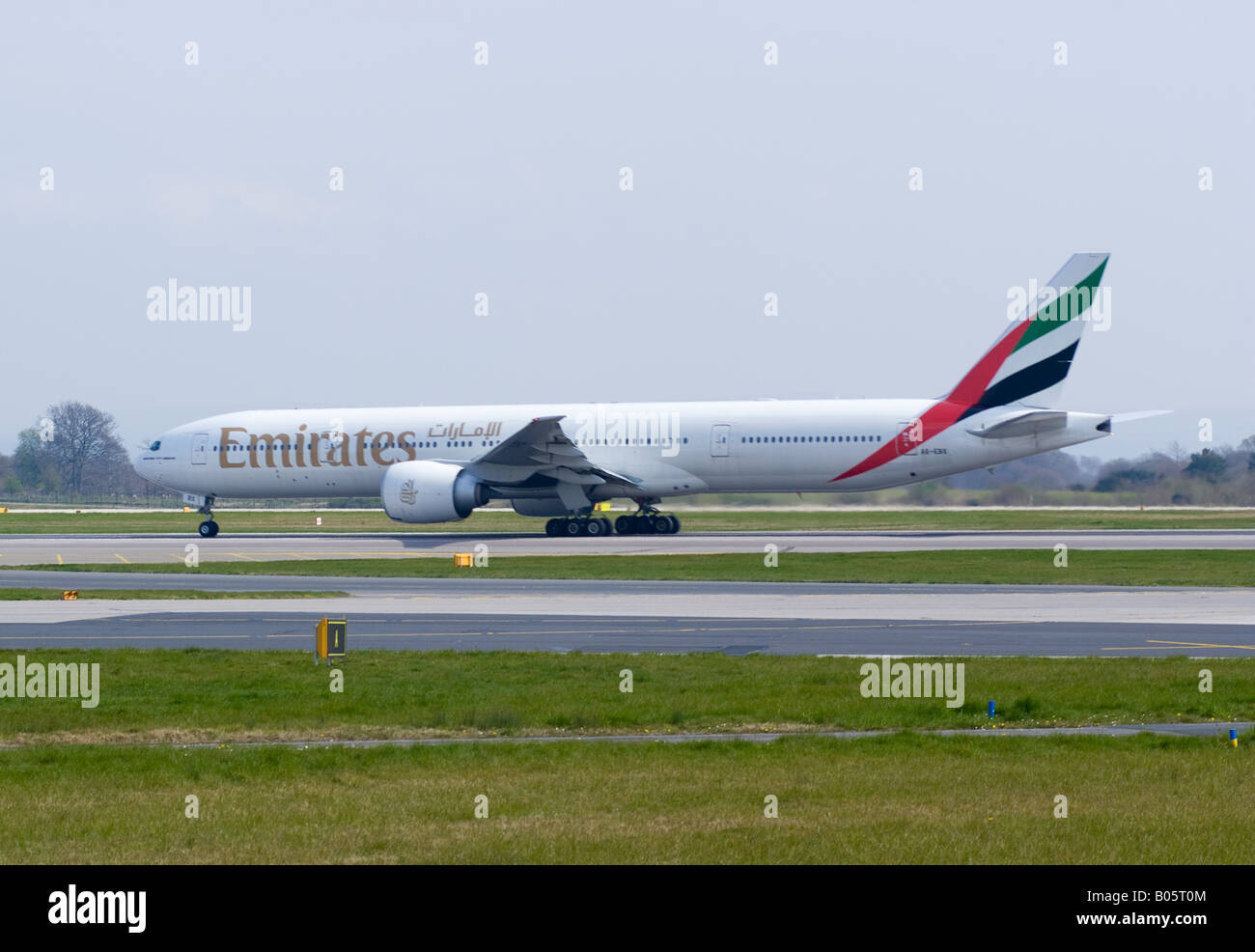 Emirates Boeing 777-31H Taking Off From Manchester Ringway Airport England United Kingdom Stock Photo