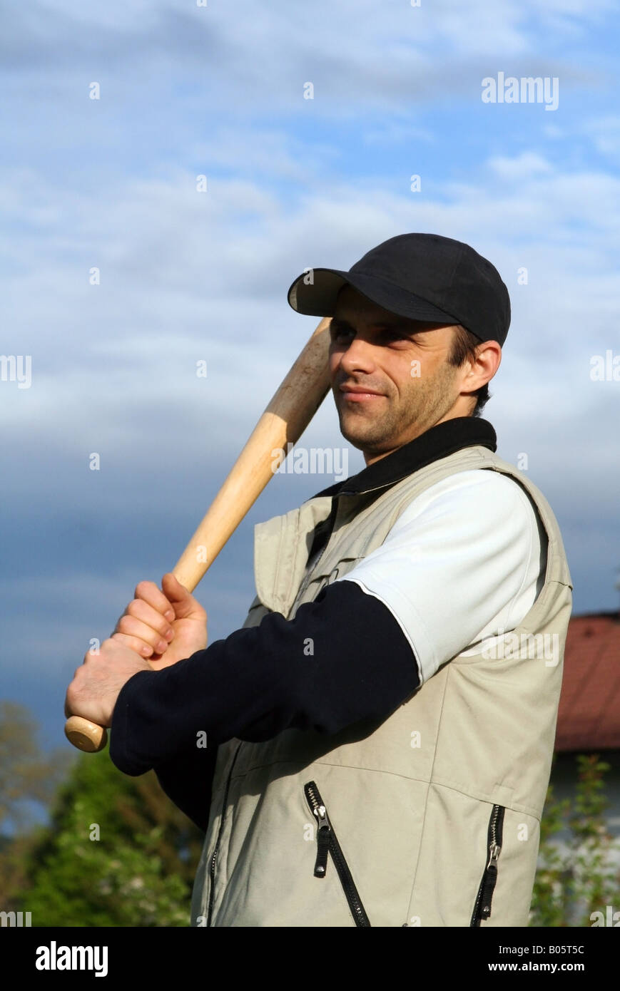 Man practicing baseball with baseball bat in hands Stock Photo Alamy
