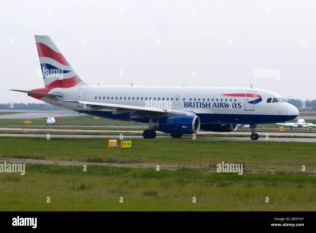 British Airways Airbus A319-131 Taxiing for Take-off at Manchester Ringway Airport Greater Manchester England United Kingdom Stock Photo