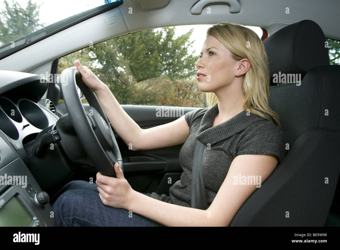 Woman driving car Stock Photo