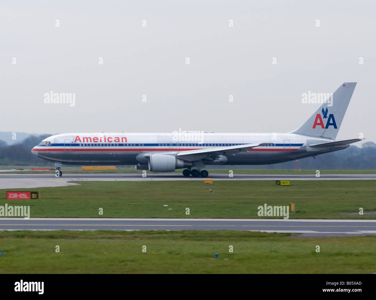 American Airlines Boeing 767-300 Accelerating on Runway for Take-off at Manchester Ringway Airport Greater Manchester England UK Stock Photo