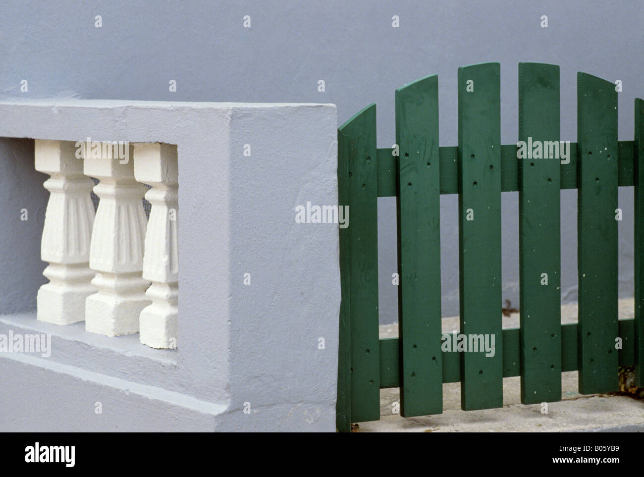 geometric shapes with green gate and balustrade outside house in  St George's, Bermuda Stock Photo