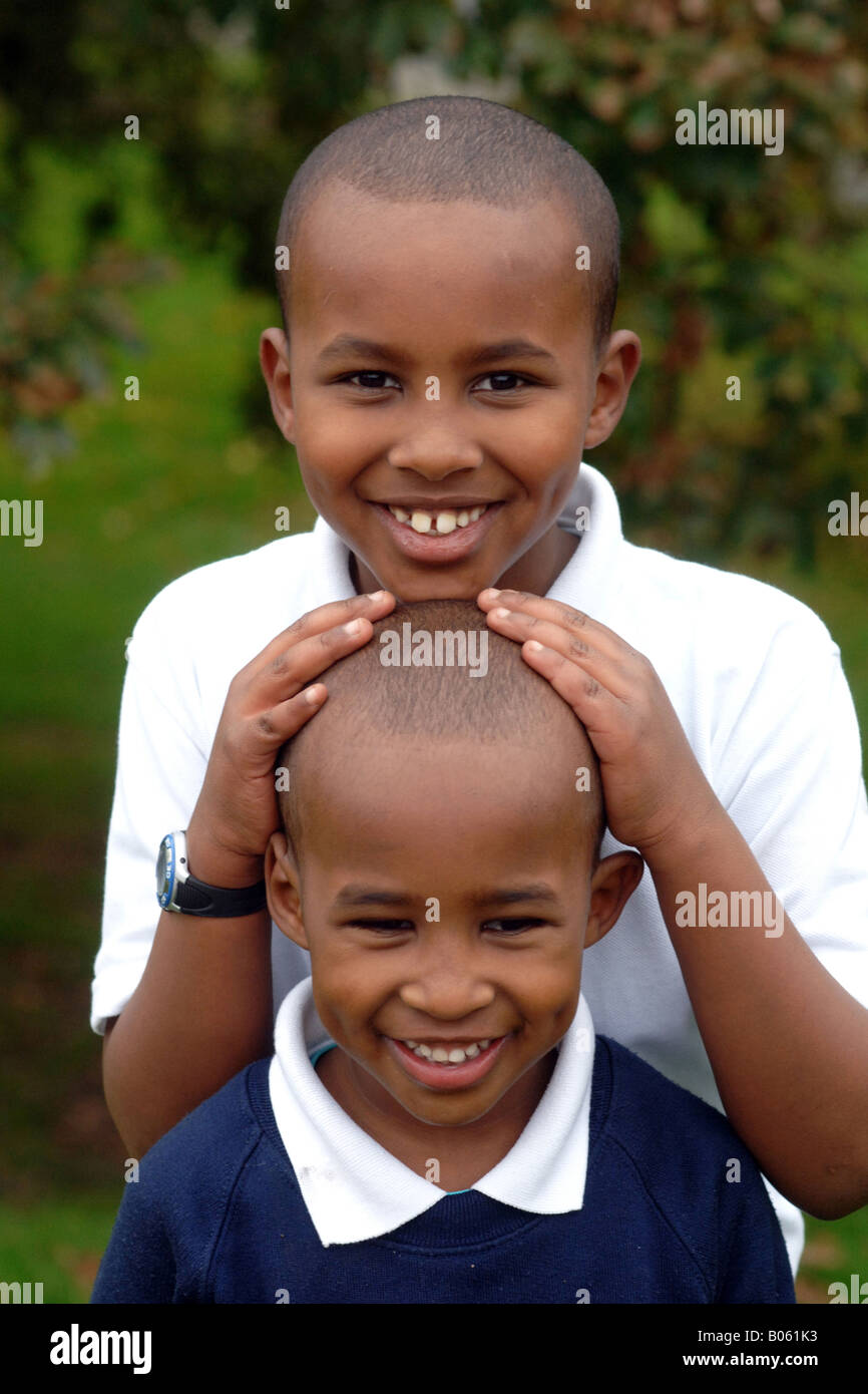 Two Refugee brothers at a 'Starting Point' School, UK. Stock Photo