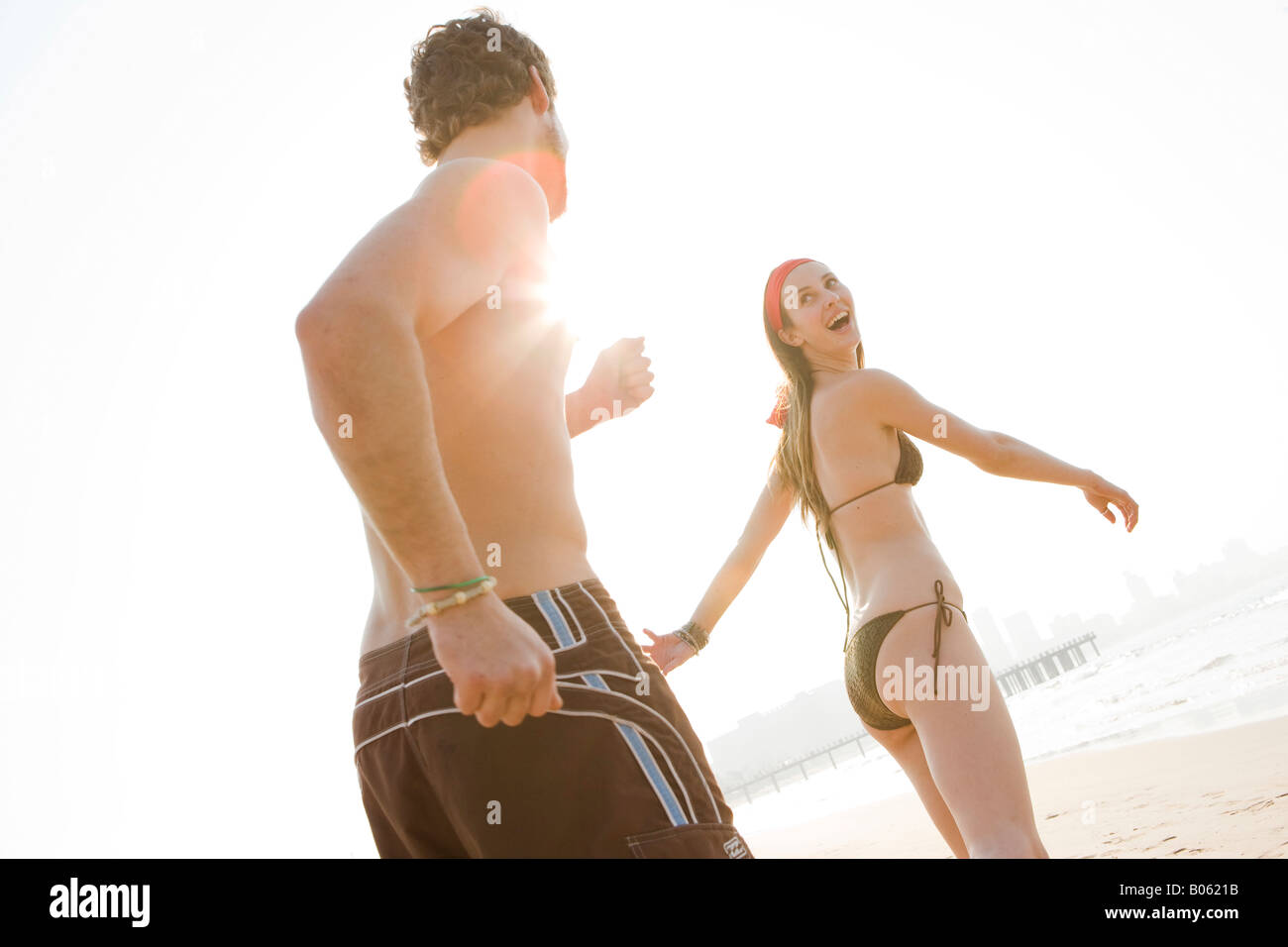 woman and man at the beach Stock Photo