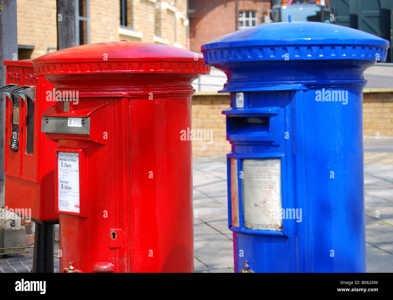 Red and blue airmail post boxes, High Street, Windsor, Berkshire, England, United Kingdom Stock Photo