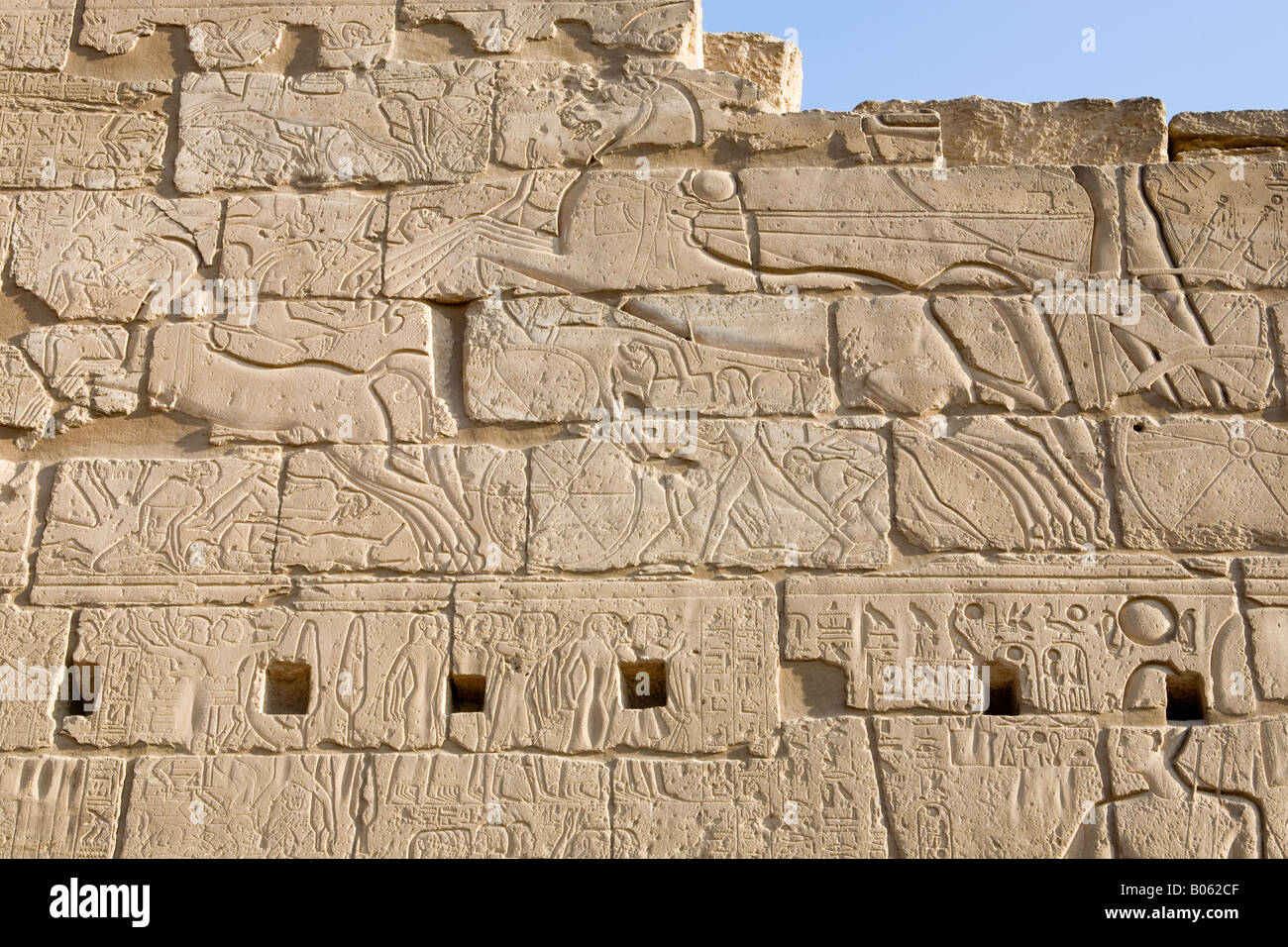 Carved relief wall at Luxor Temple Egypt Stock Photo