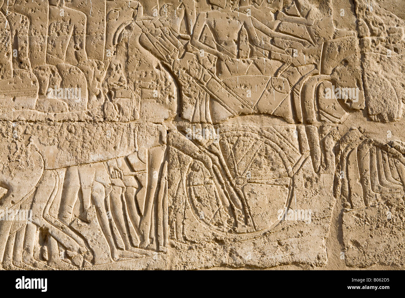 Carved relief on wall at Luxor Temple Egypt Stock Photo
