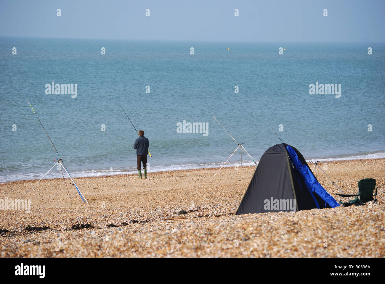 Fishing off beach, Beachlands, Hayling Island, Hampshire, England