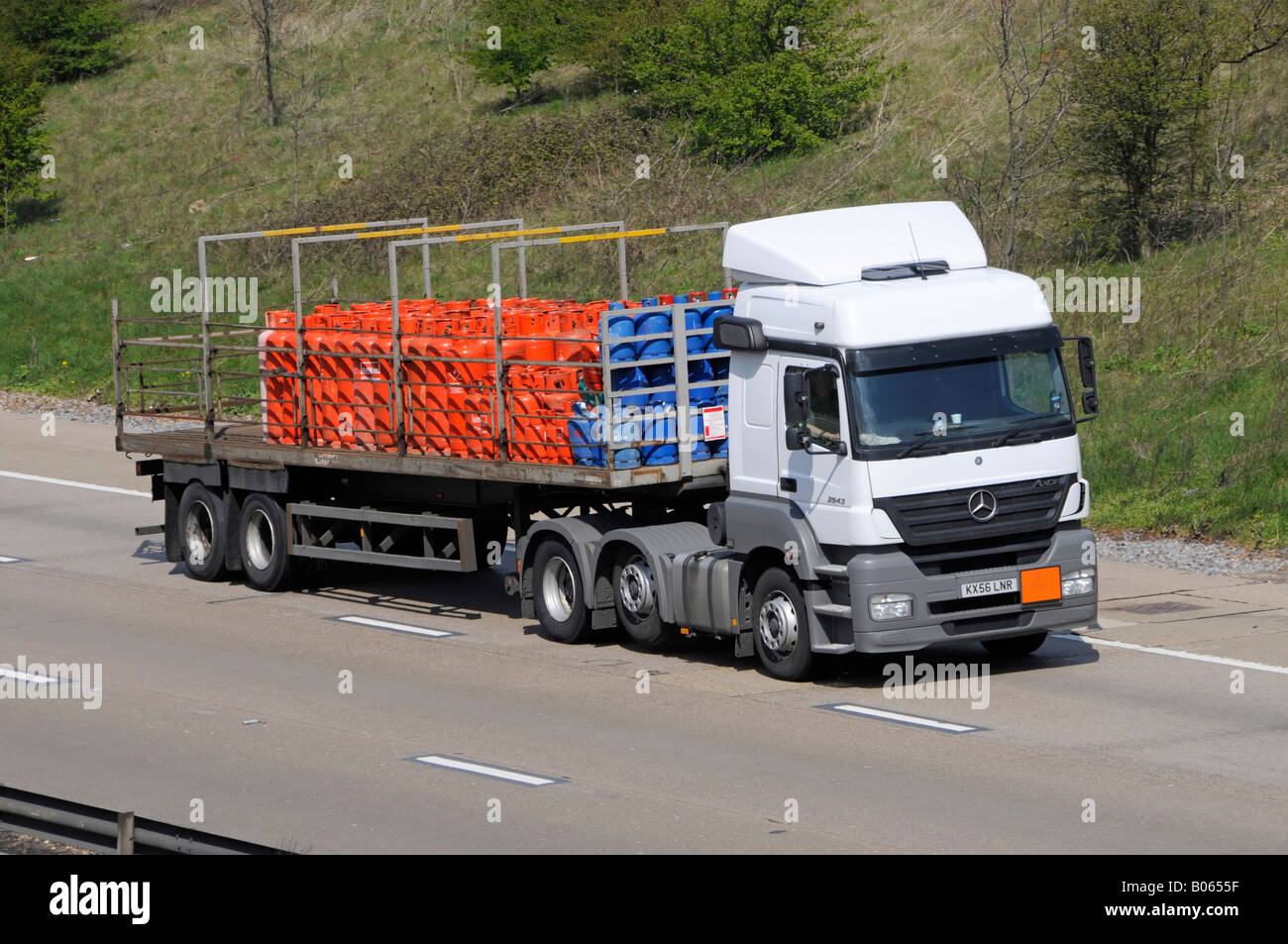 M25 motorway propane and butane liquid gas bottles Mercedes lorry Stock Photo