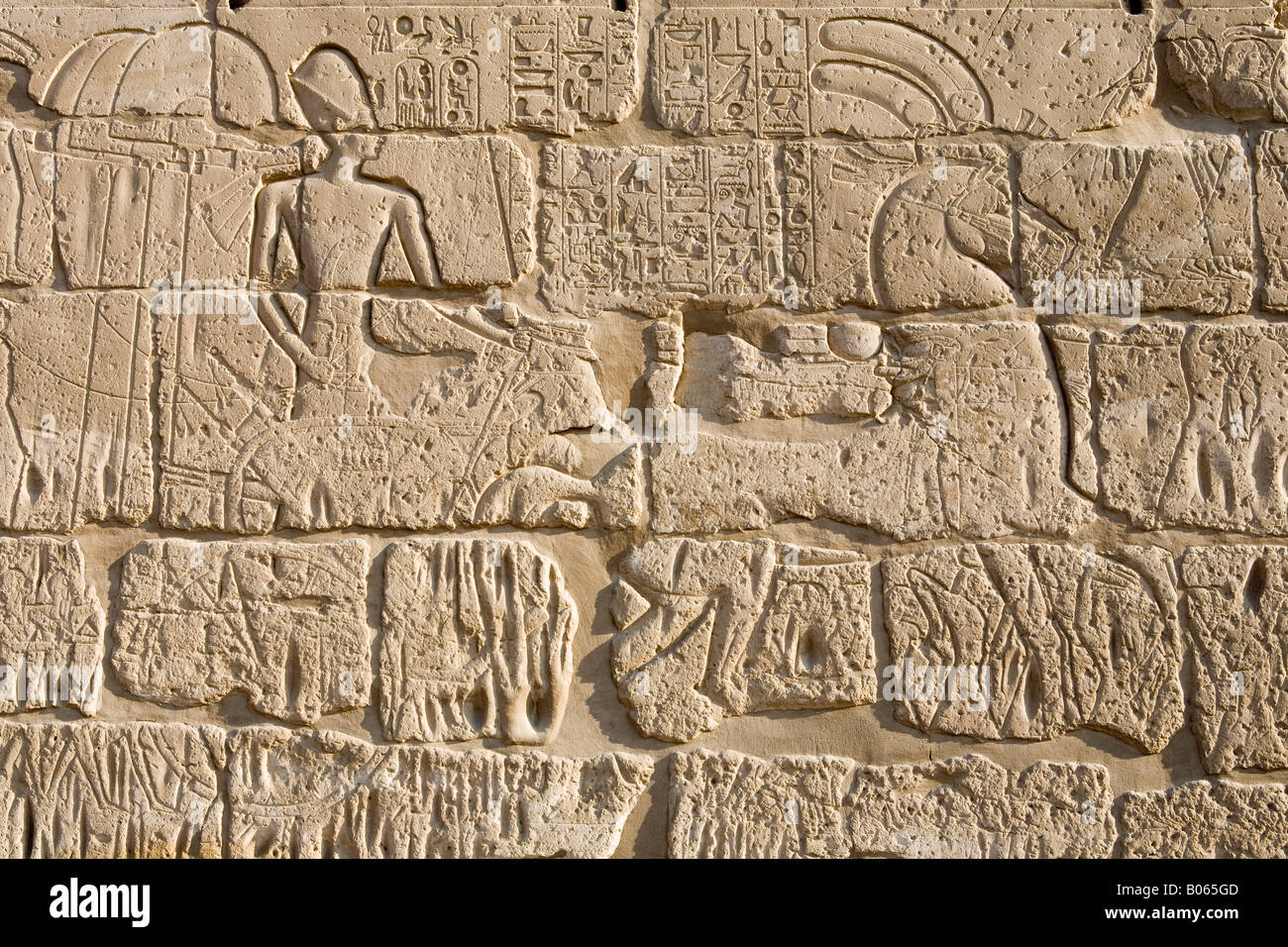 Carved relief wall at Luxor Temple Egypt Stock Photo