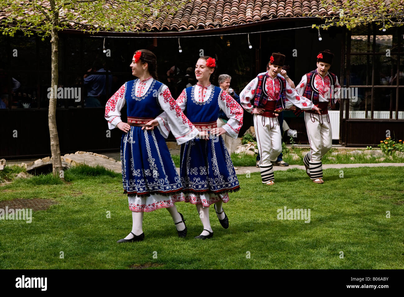 A stop for lunch at a folk style restaurant with live folklore entertainment in Arbanassi Bulgaria. Stock Photo