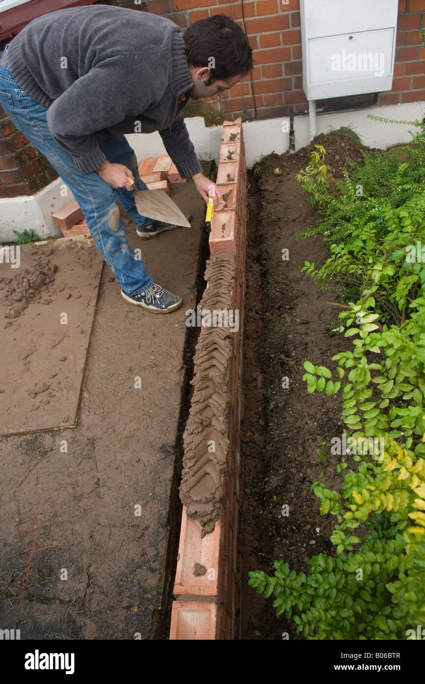 DIY How to build a brick wall Stock Photo Alamy