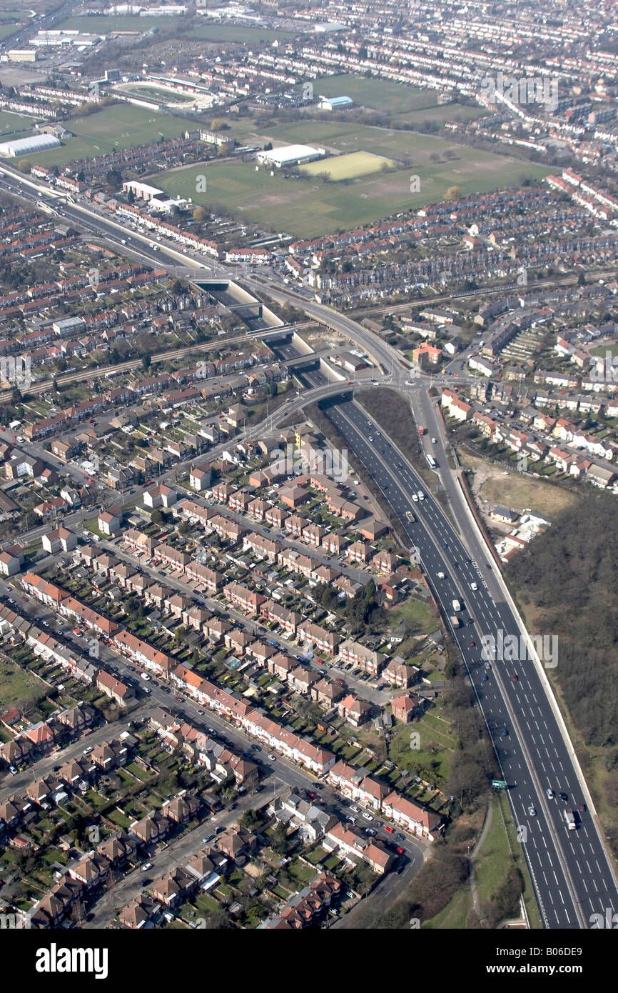 Aerial view north west of A406 Walthamstow sports ground suburban houses Waltham Forest London E4 E17 England UK High level obli Stock Photo