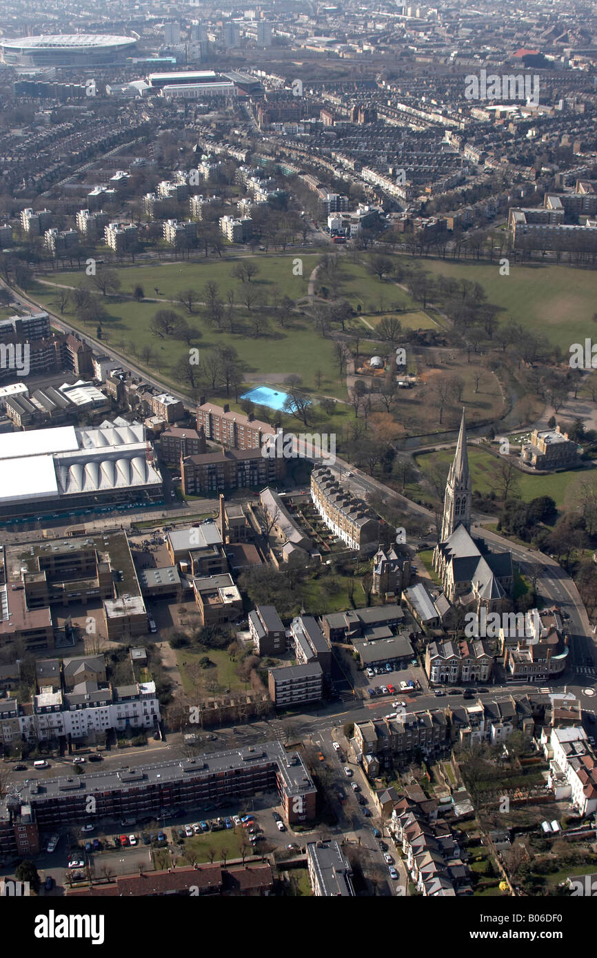 Aerial view west of Arsenal FC football stadiums Highbury Emirates Clissold Park Council offices suburban houses church Hackney Stock Photo