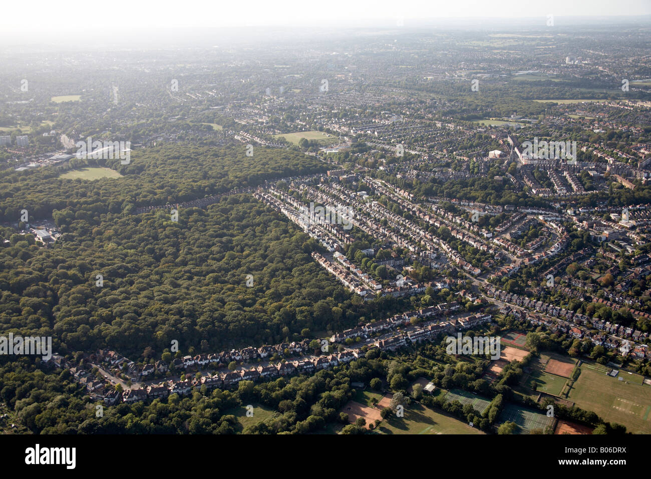 Aerial view north west of Highgate Wood Queen s Wood suburban houses and tennis courts London N6 N10 England UK Stock Photo