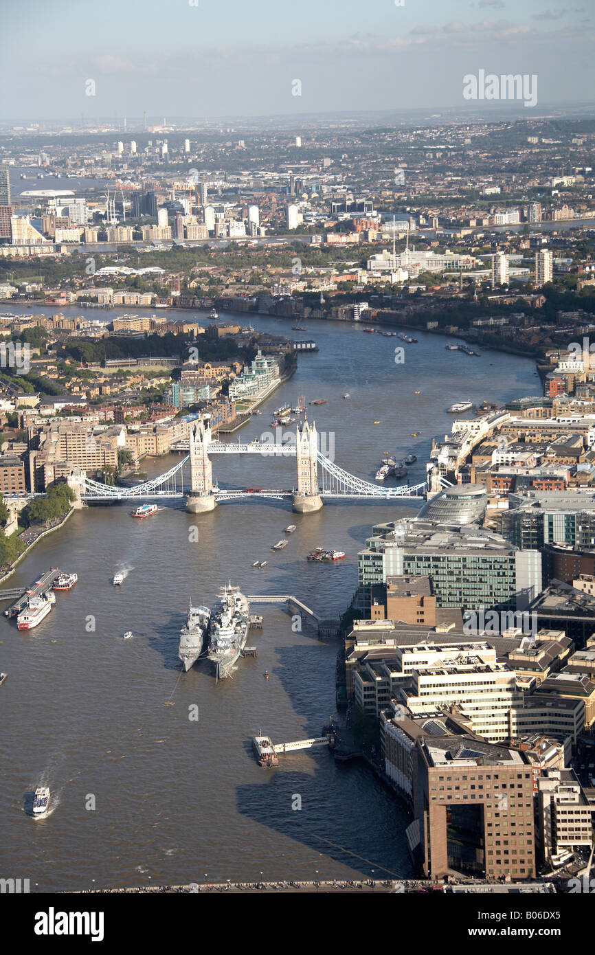 Aerial view south east of Tower Bridge H M S Belfast River Thames Bermondsey Shadwell Rotherhithe London SE1 E1 SE16 England UK Stock Photo