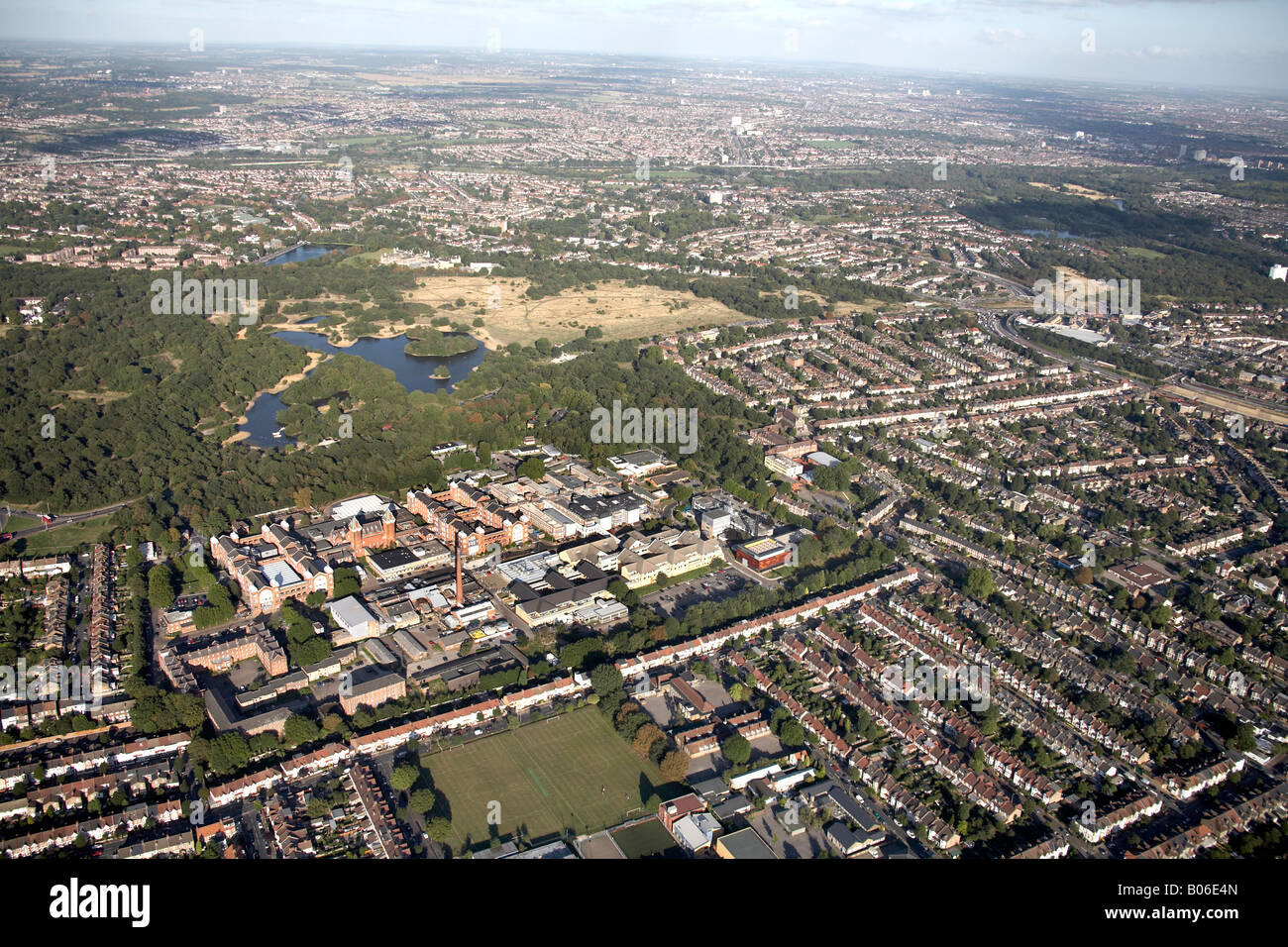 Aerial view north east of Hollow Pond Boating Lake Whipps Cross Hospital London South Bank University suburban housing Wanstead Stock Photo