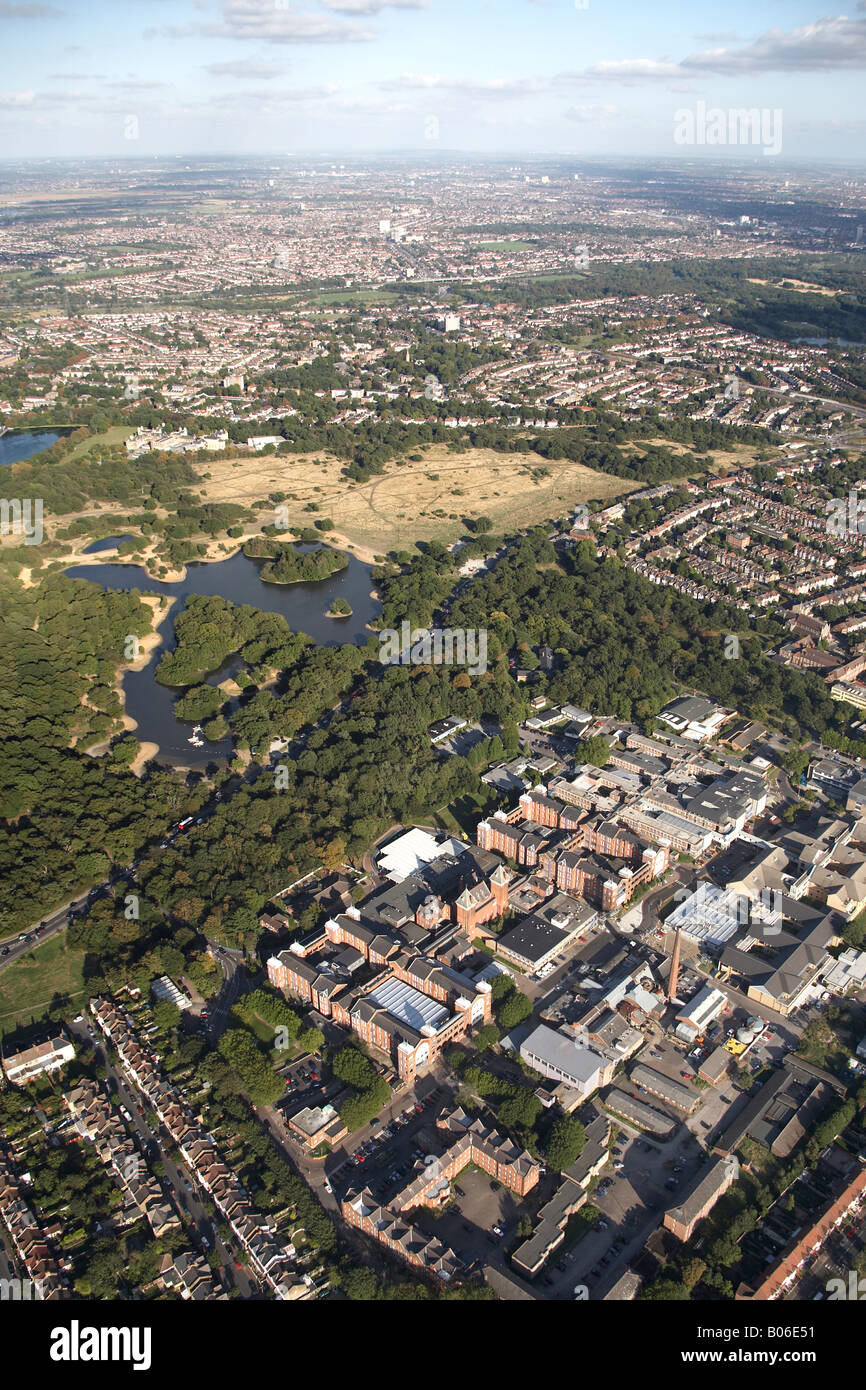 Aerial view north east of Hollow Pond Boating Lake Whipps Cross Hospital London South Bank University suburban housing Snaresbro Stock Photo