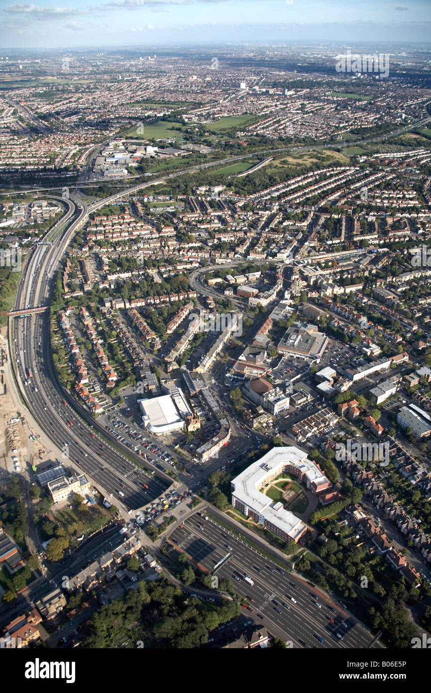 Aerial view south east of Southend Rd A406 Junction 4 Charlie Brown s Roundabout suburban housing and retail park South Woodford Stock Photo