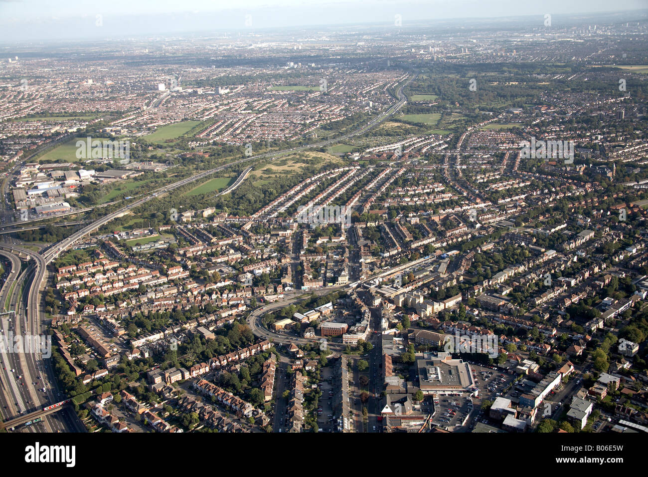 Aerial view south east of Junction 4 Charlie Brown s Roundabout suburban housing retail park South Woodford Snaresbrook E18 E11 Stock Photo