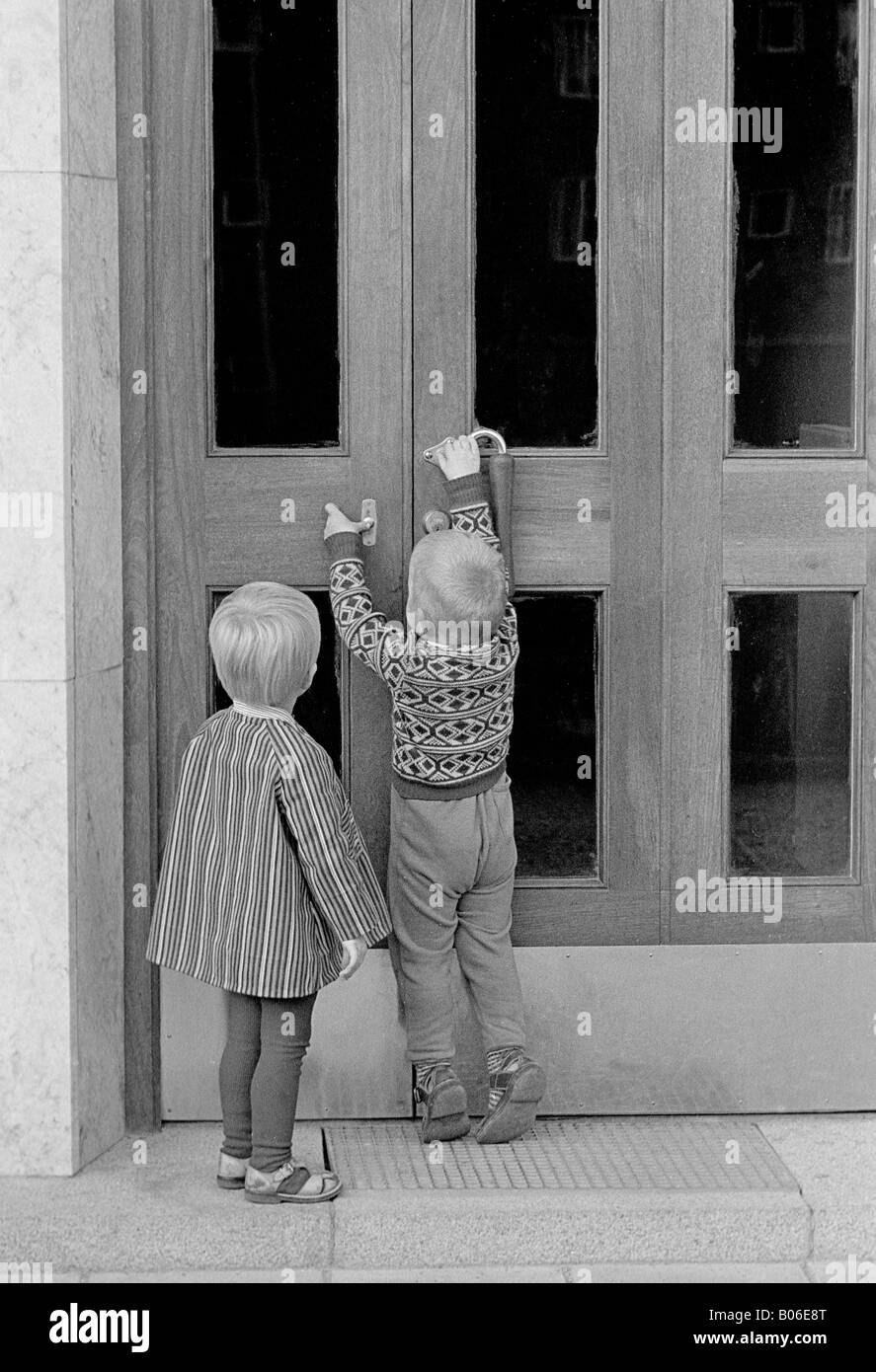 Ringing the door bell Stock Photo