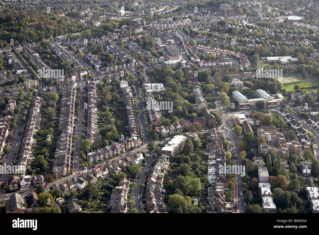 Aerial view south of suburban houses and tower blocks playing fields Colney Hatch Lane Page s Hill Muswell Hill London N10 UK Stock Photo