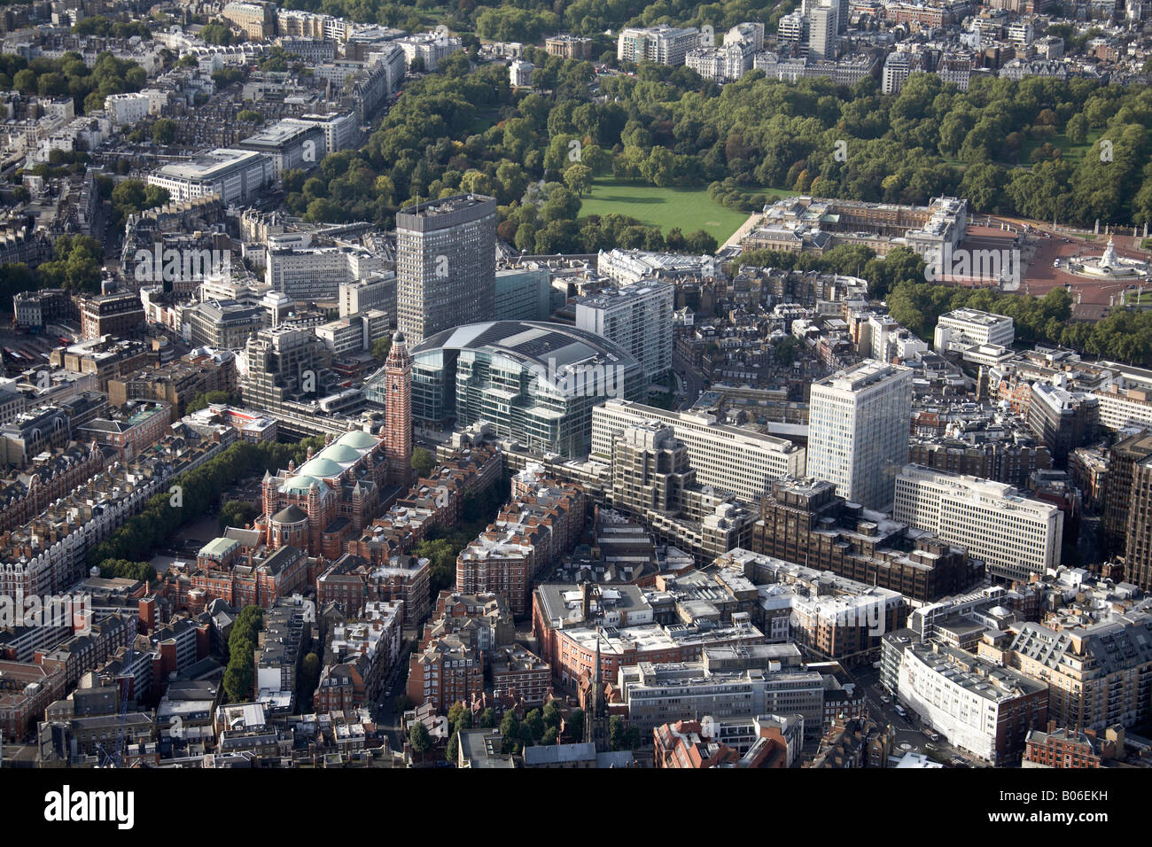 Aerial view north west of inner city buildings Westminster Cathedral Victoria Street Buckingham Palace and gardens London SW1 En Stock Photo