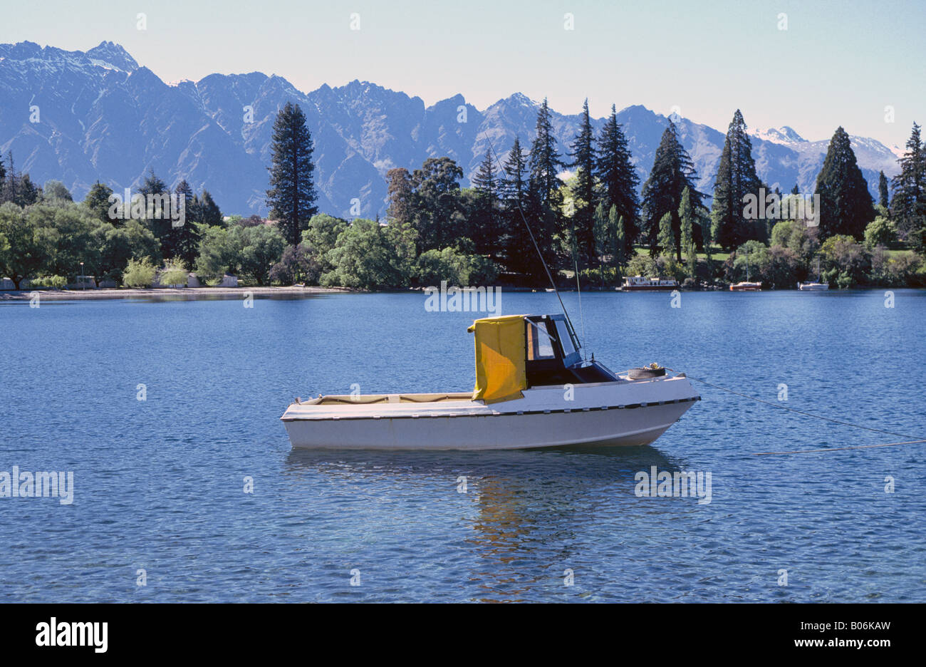 A fishing boat in the harbor at Queenstown below the Remarkable