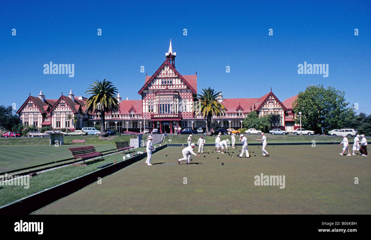 Lawn bowlers enjoy a beautiful day at the local lawn bowling club in Rotorua, New Zealand. Stock Photo