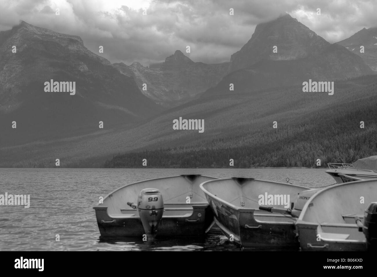 a beautiful grey day in Glacier National Park,sitting next to a dock