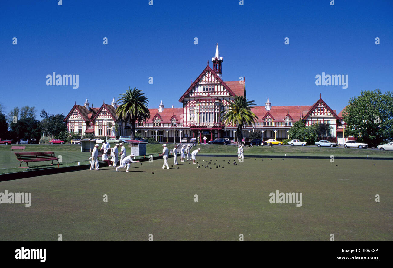 Lawn bowlers enjoy a beautiful day at the local lawn bowling club in Rotorua, New Zealand. Stock Photo