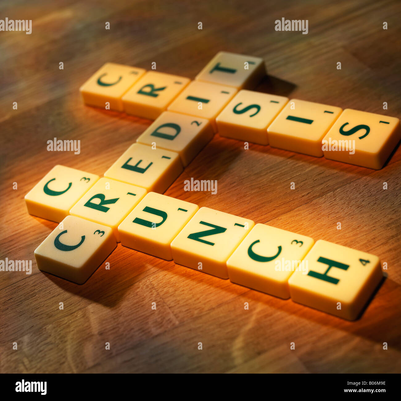 SCRABBLE LETTERS SPELLING THE WORDS CREDIT CRISIS CRUNCH Stock Photo