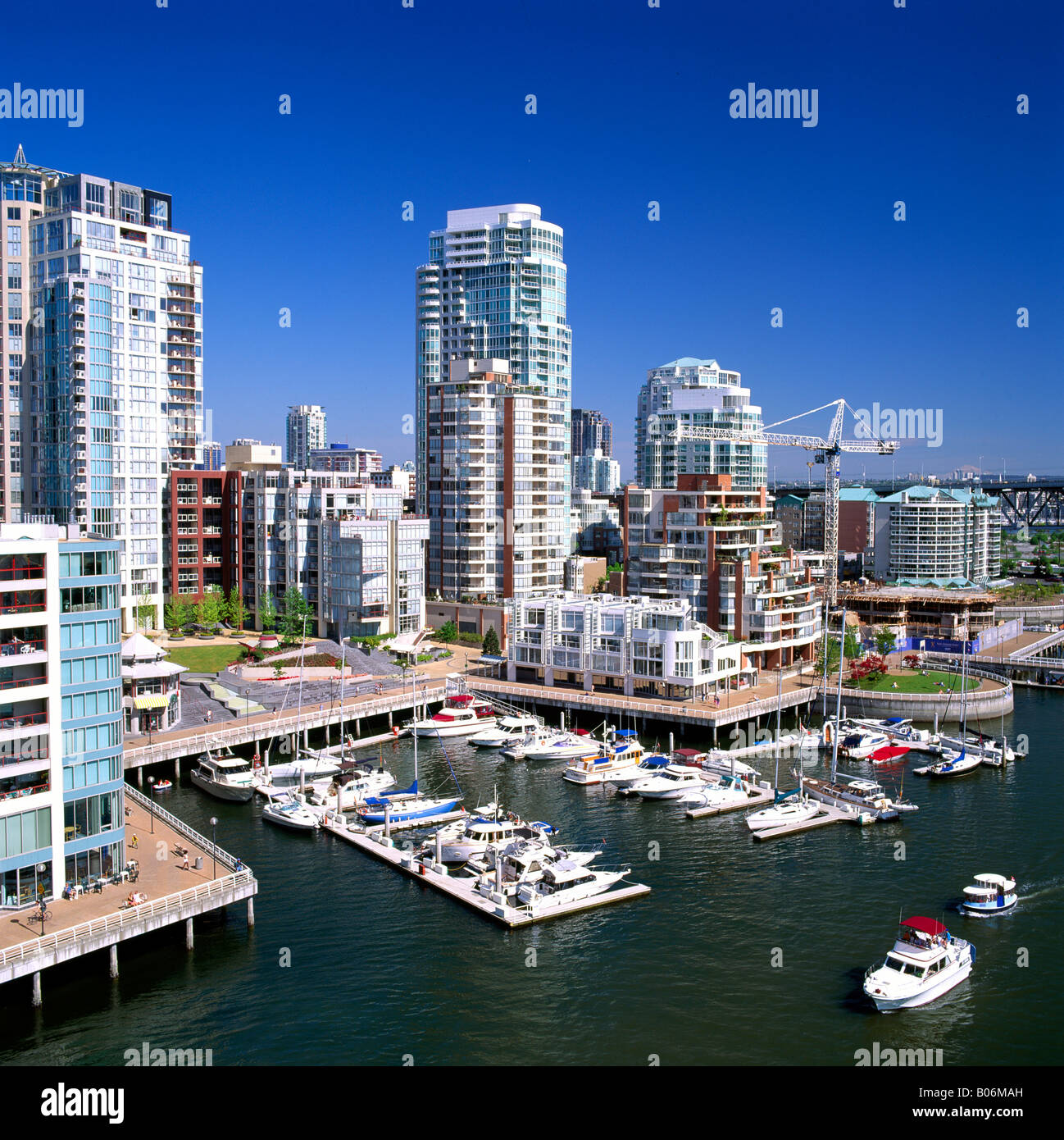 Curated visual reference: High Rise Apartment And Condominium Buildings And Marina At False Photo Inspiration
