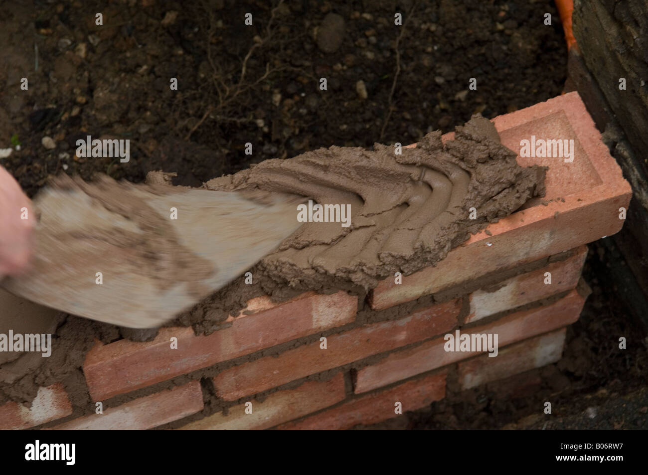 DIY How to build a brick wall Stock Photo Alamy