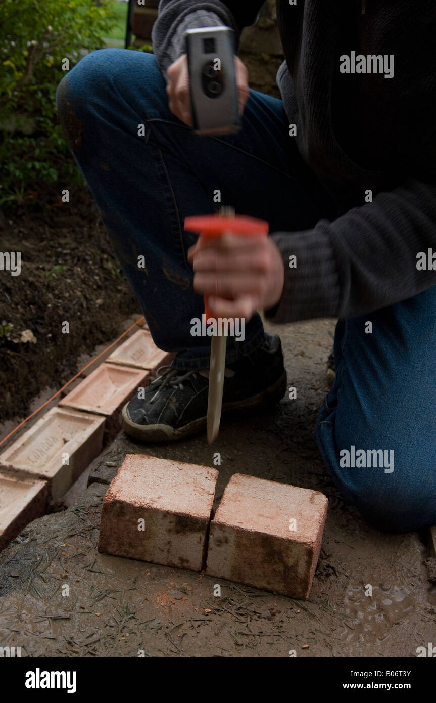 DIY How to build a brick wall Stock Photo Alamy